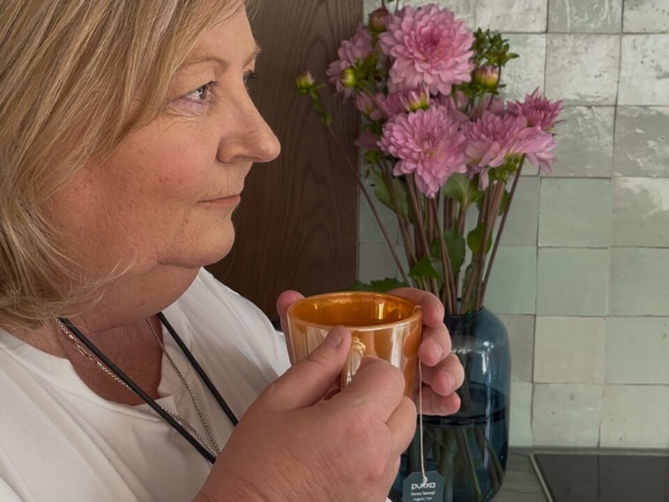 Indulging in a cup of herbal tea